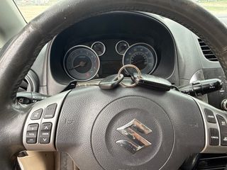 2011 Suzuki SX4 - Interior Steering Wheel With Keys Image